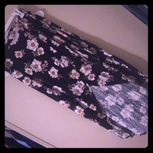 Size M black skirt with white floral design